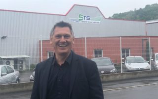 Stéphan Mazars devant les bureaux de sa société STS, rue de la Renaissance, à Decazeville./ Photo DDM, MCB